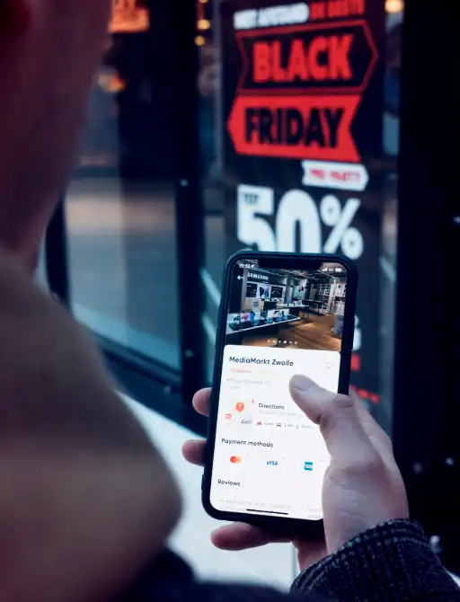 person holding black samsung android smartphone